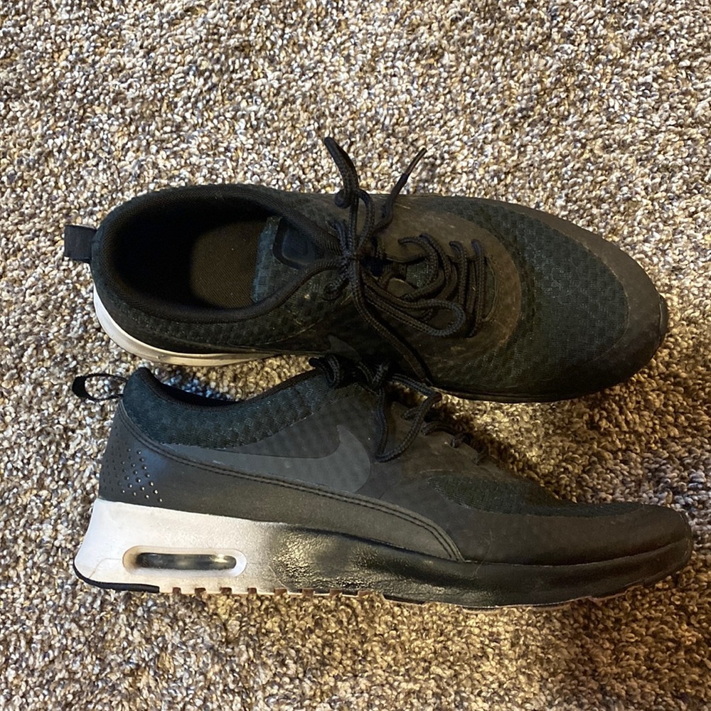 Black and white Nike shoes